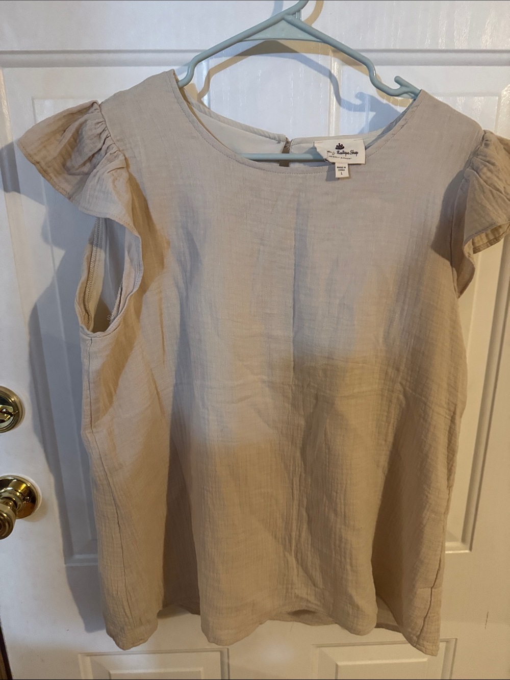 Betsy‘s boutique Cream Ruffle Top